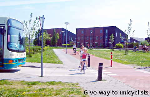 Unicycles for school commuting in the Netherlands. Cycling to school.